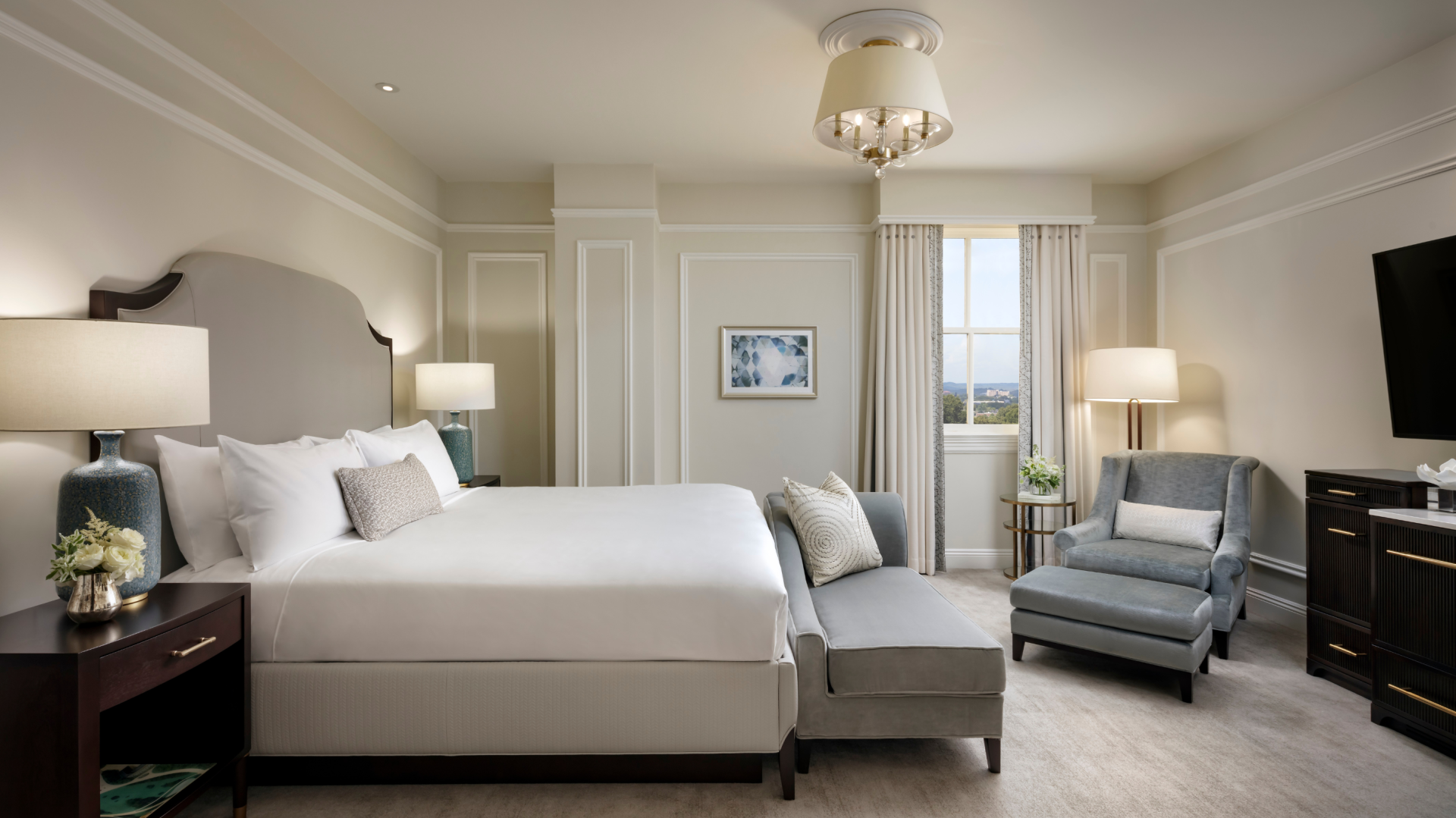 a bedroom with a bed and a couch