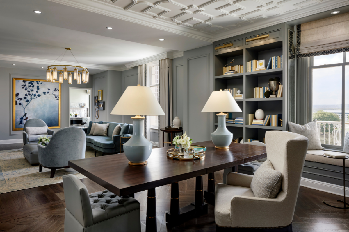 a room with a table and chairs