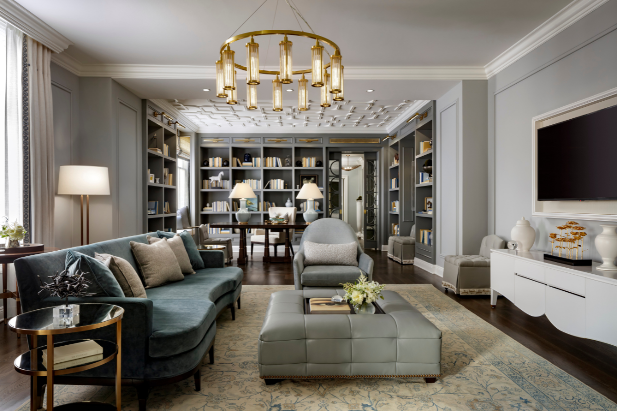a living room with a chandelier and couches