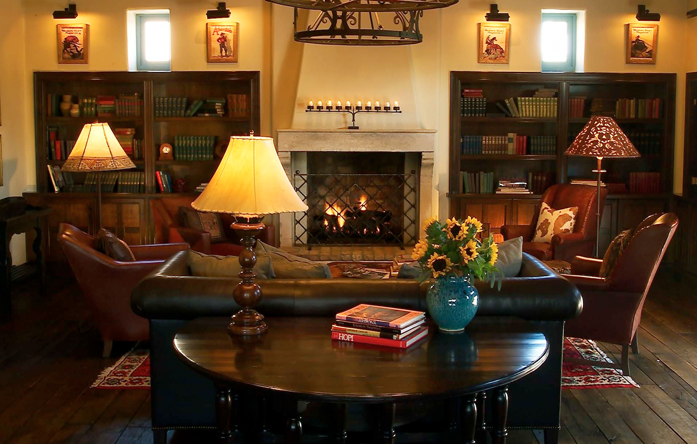 a living room with a fireplace and a couch