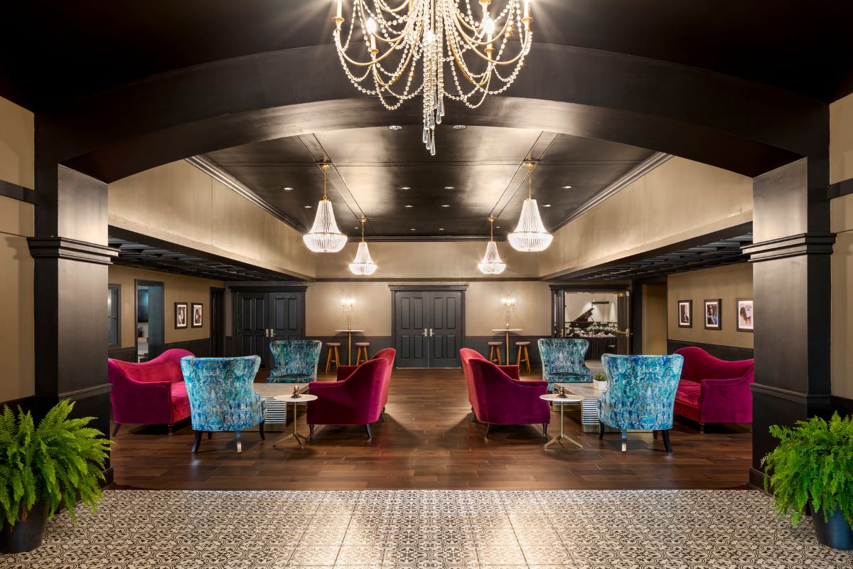 a room with chairs and tables