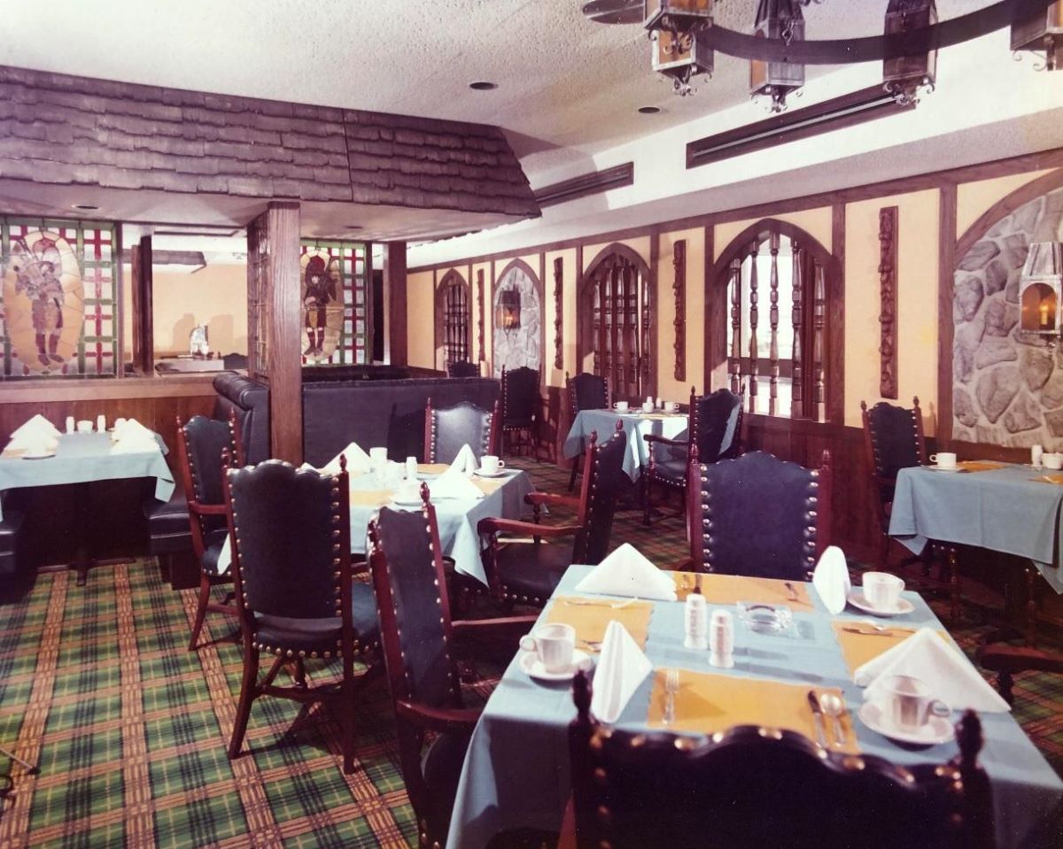 a restaurant with tables and chairs