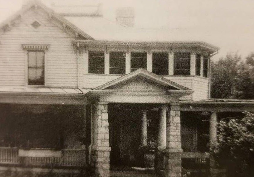 a house with columns and a porch