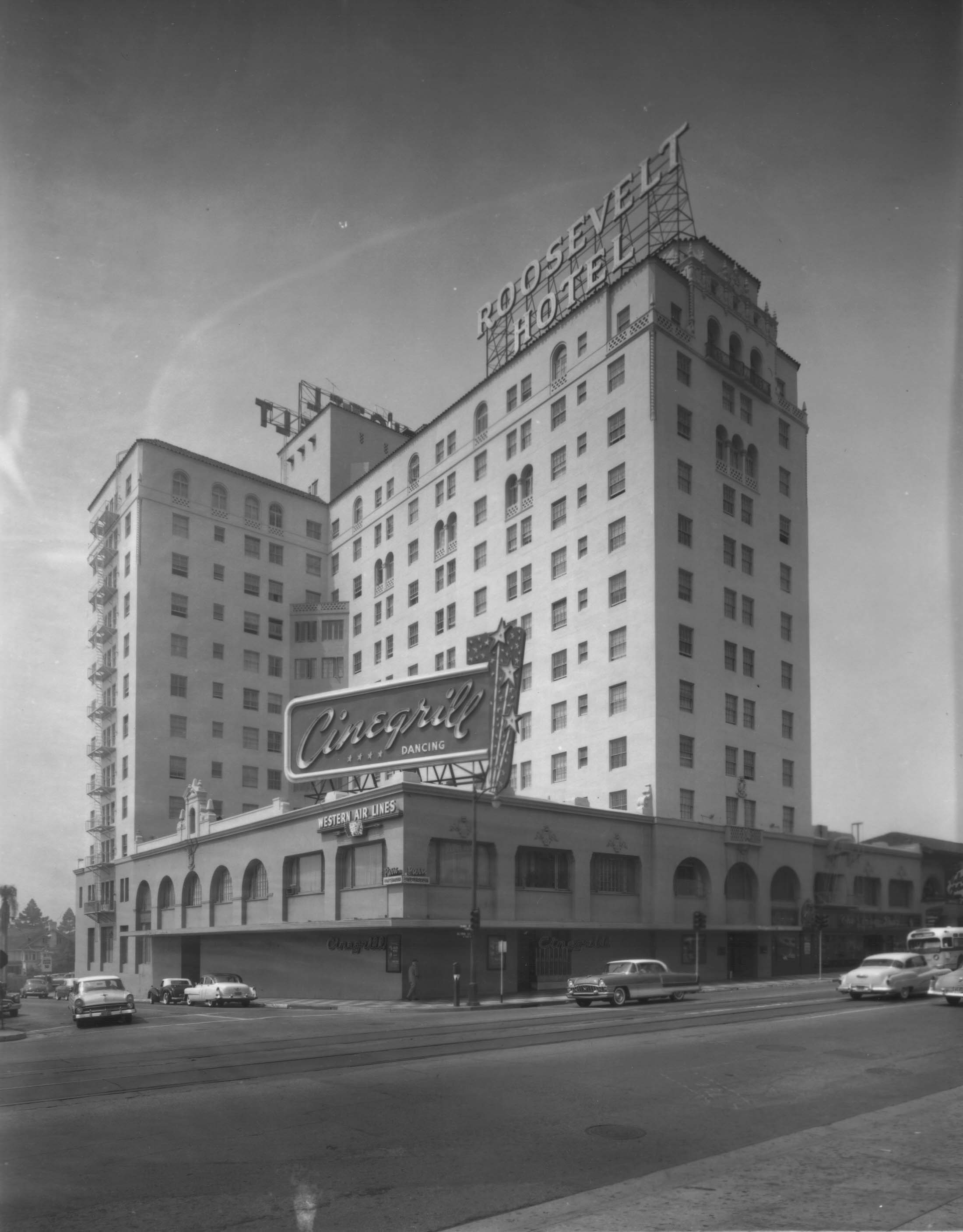 The Hollywood Roosevelt Hotel with a sign on the top