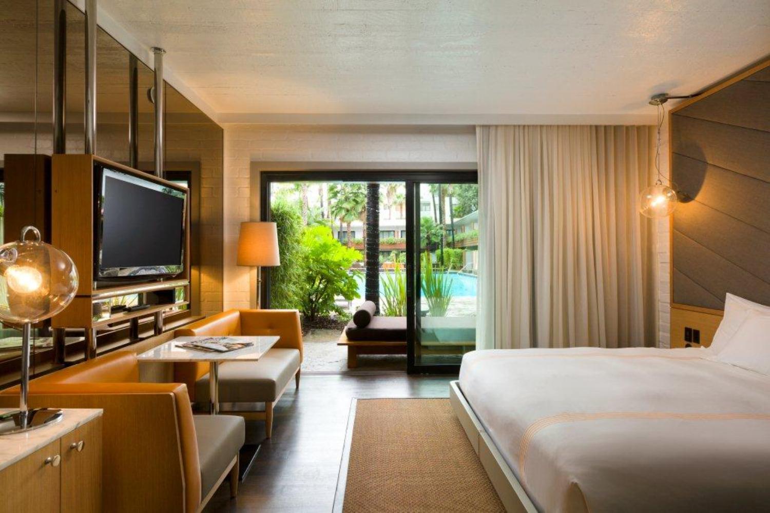 a room with a television and a bed