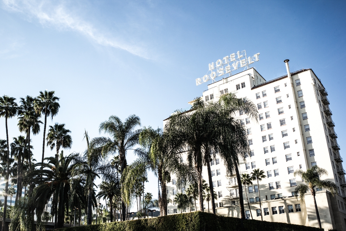 a building with palm trees