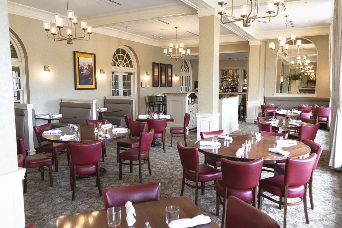 a restaurant with tables and chairs