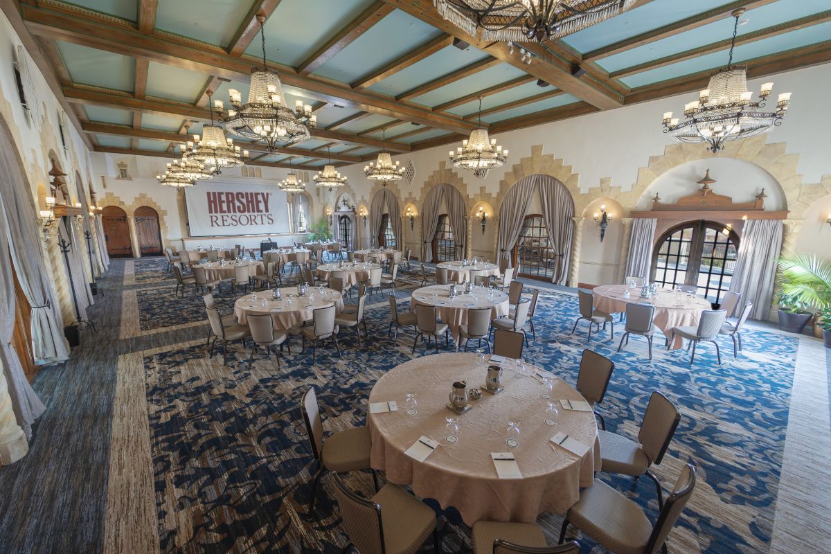 a large room with tables and chairs