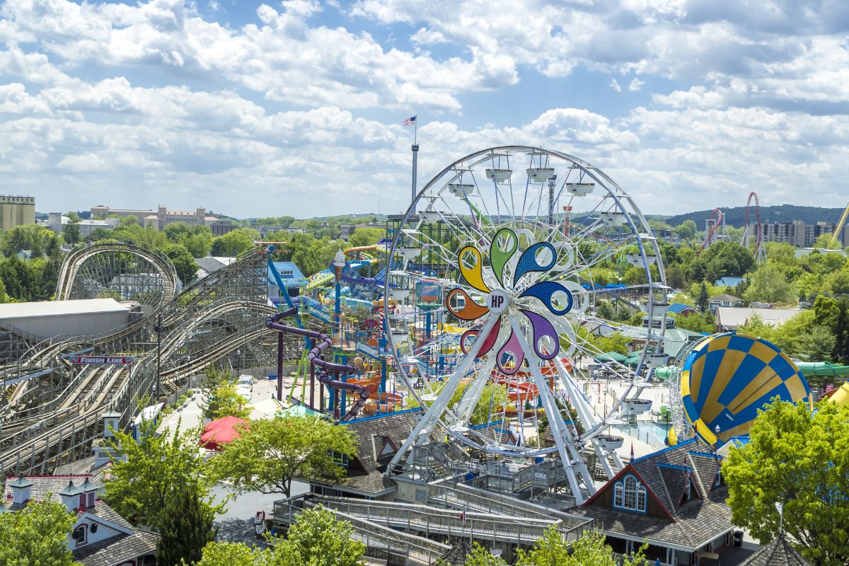 a ferris wheel and roller coasters