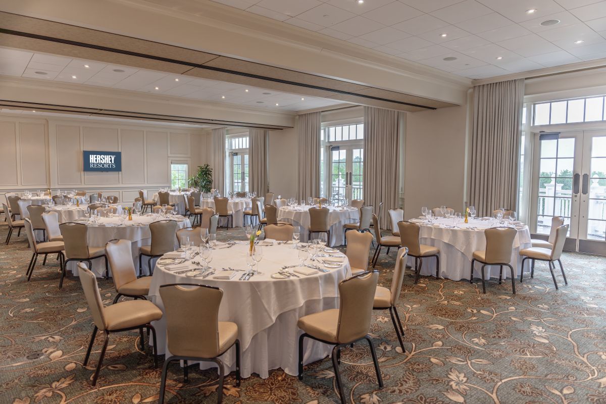 a room with tables and chairs