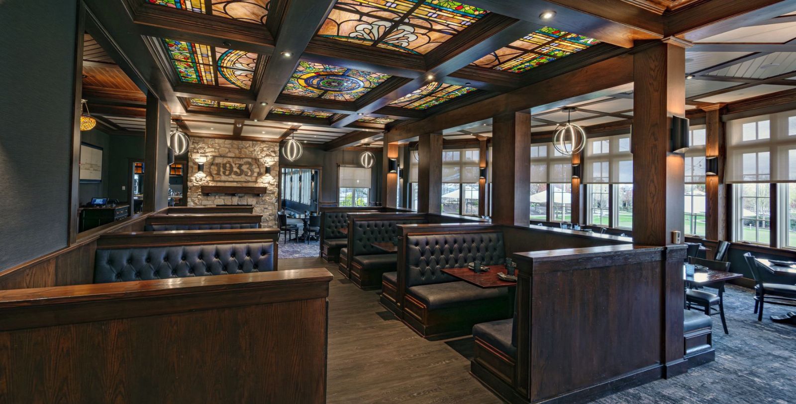 a restaurant with stained glass windows