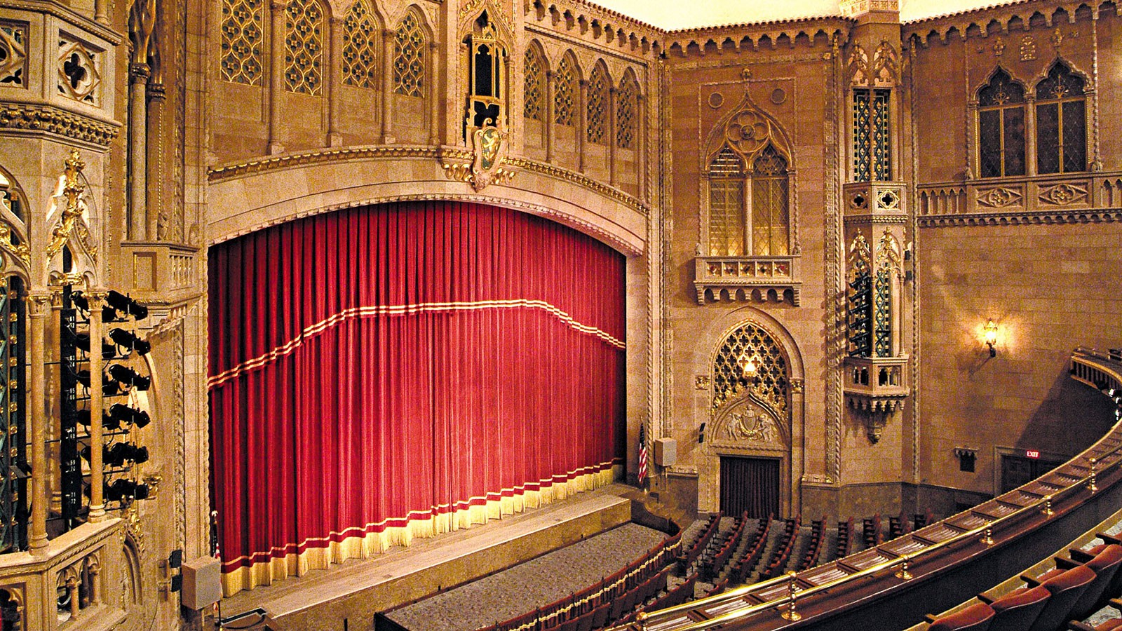 a theater with red curtains