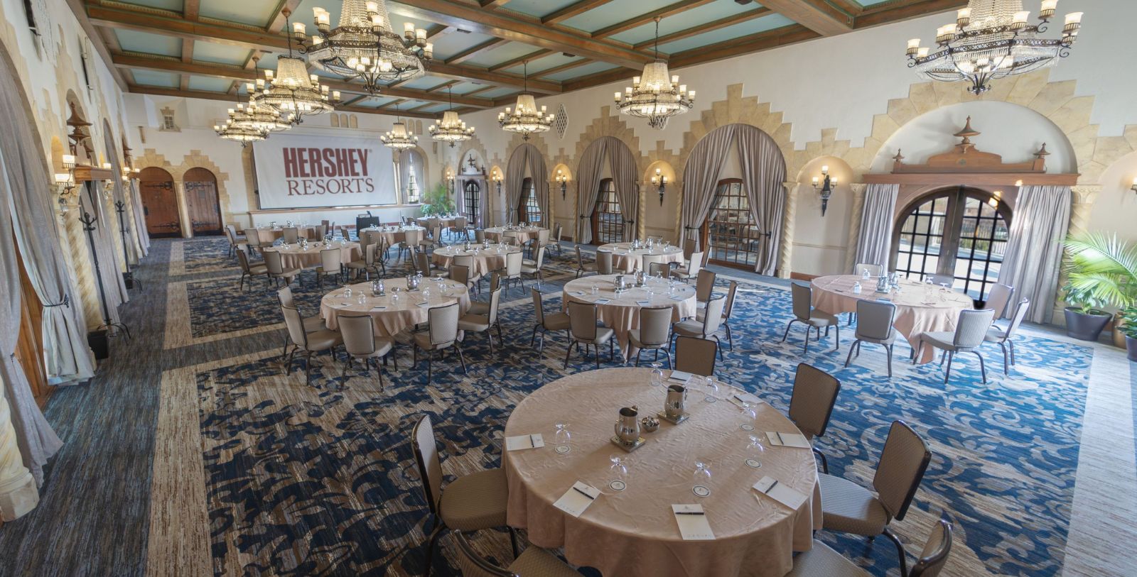 a large room with tables and chairs