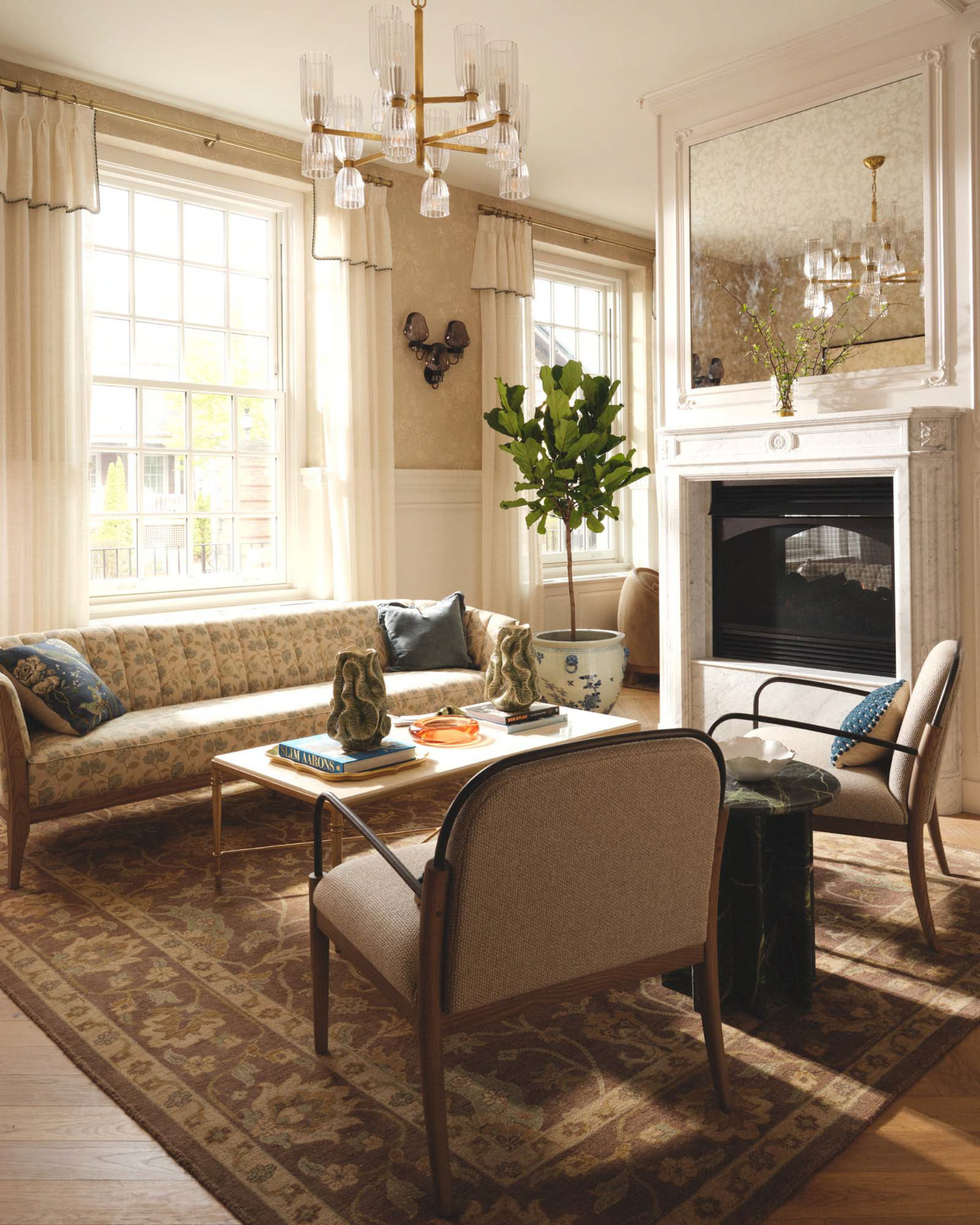 a living room with a fireplace and couches