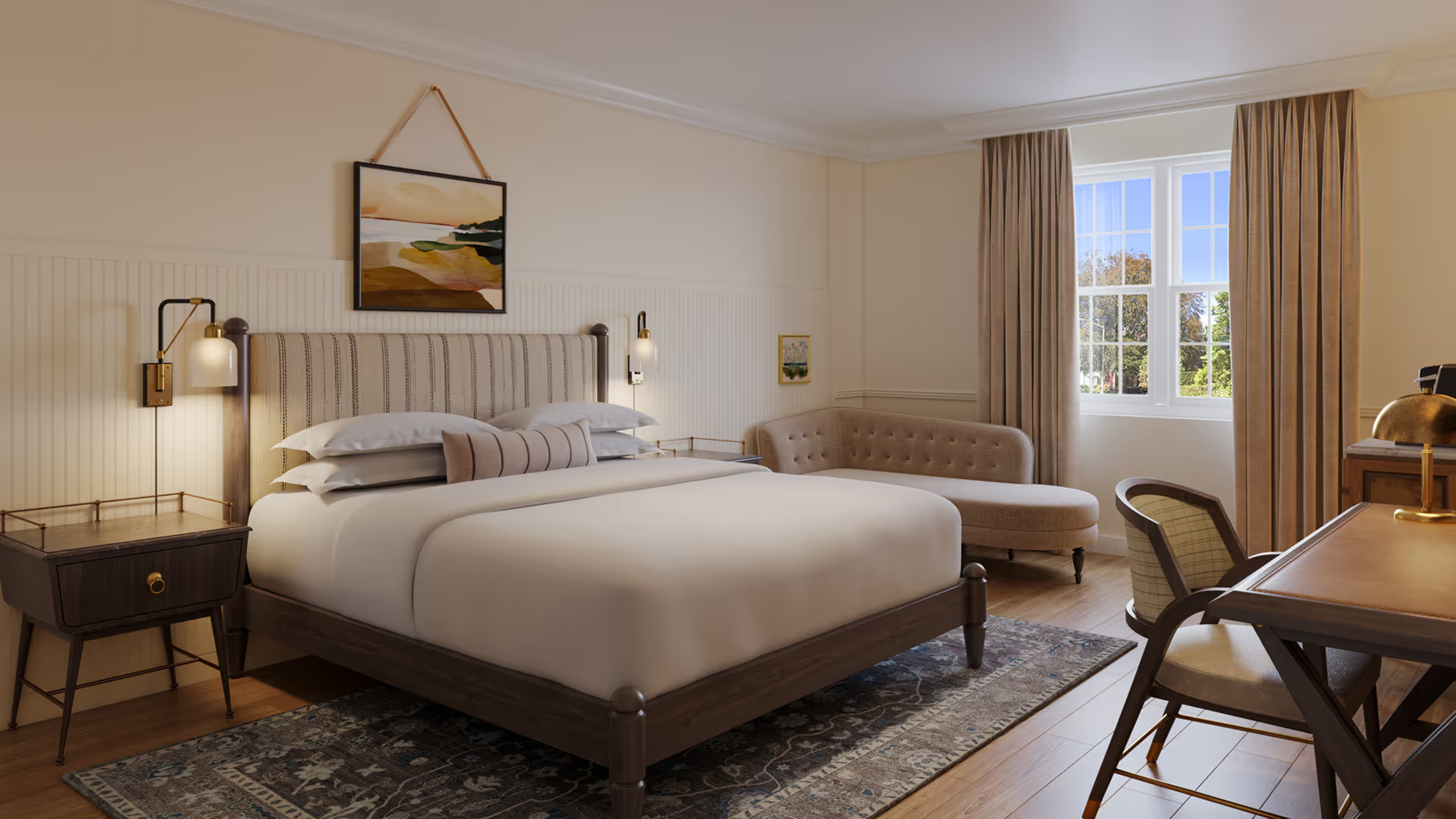 a bedroom with a bed and a couch