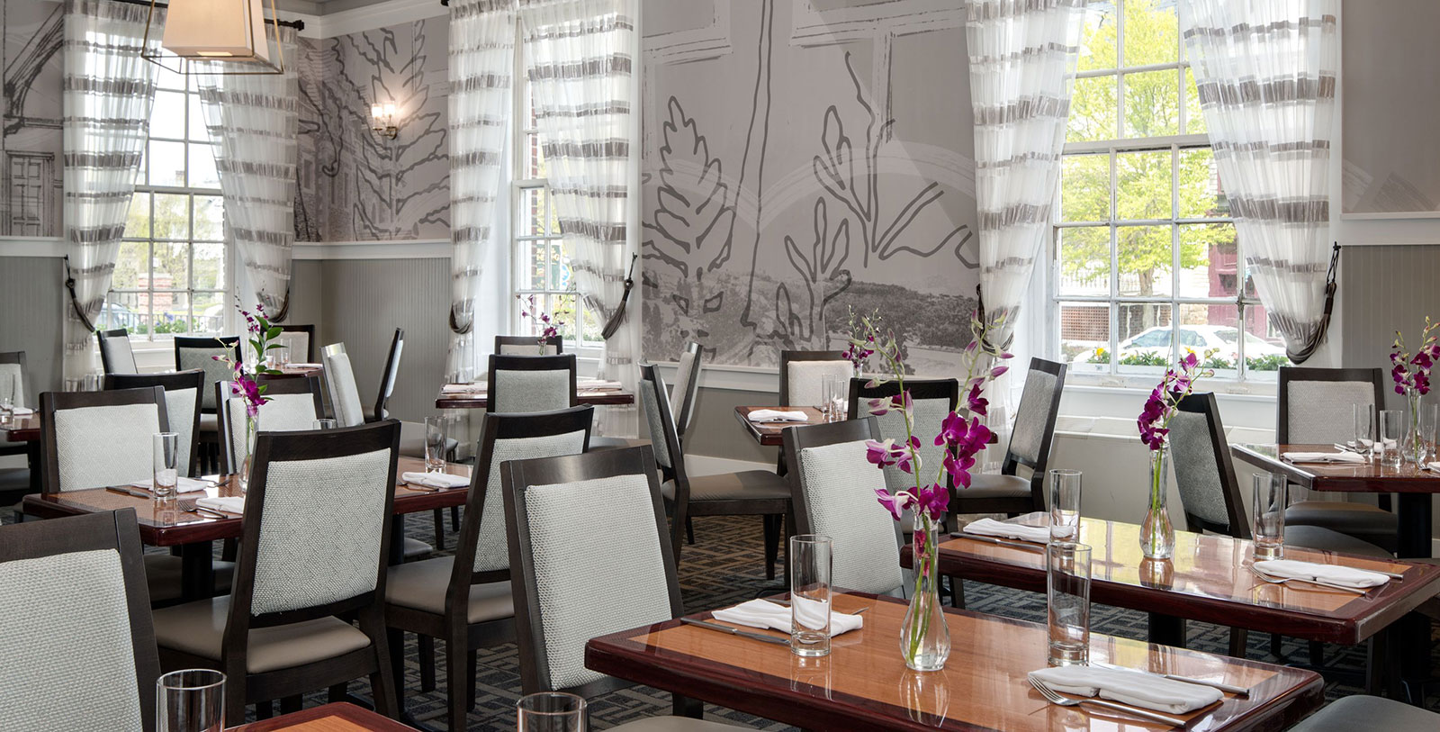 a room with tables and chairs