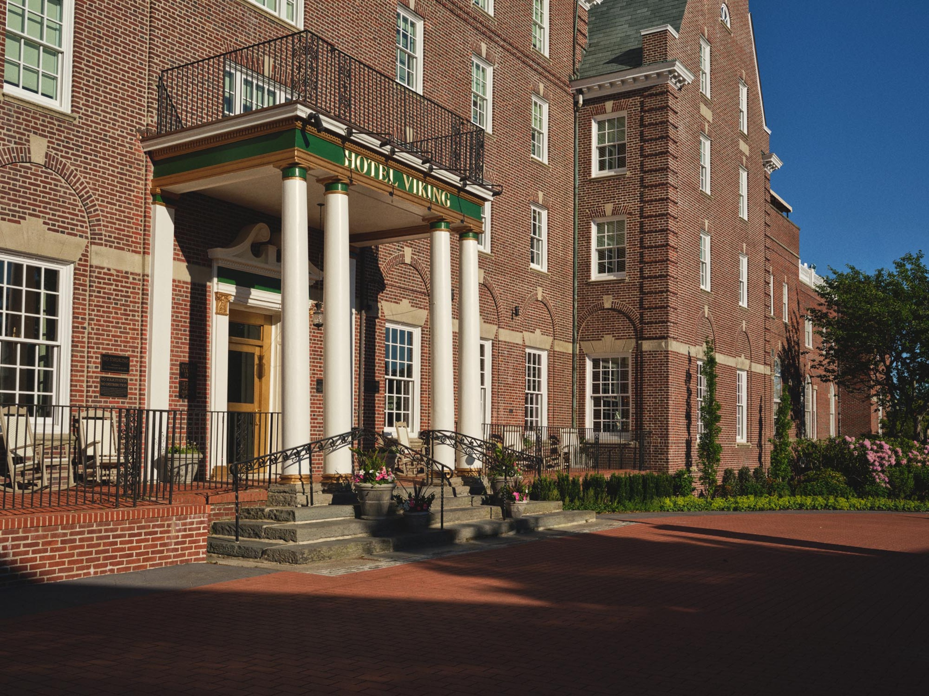 a building with columns and a balcony