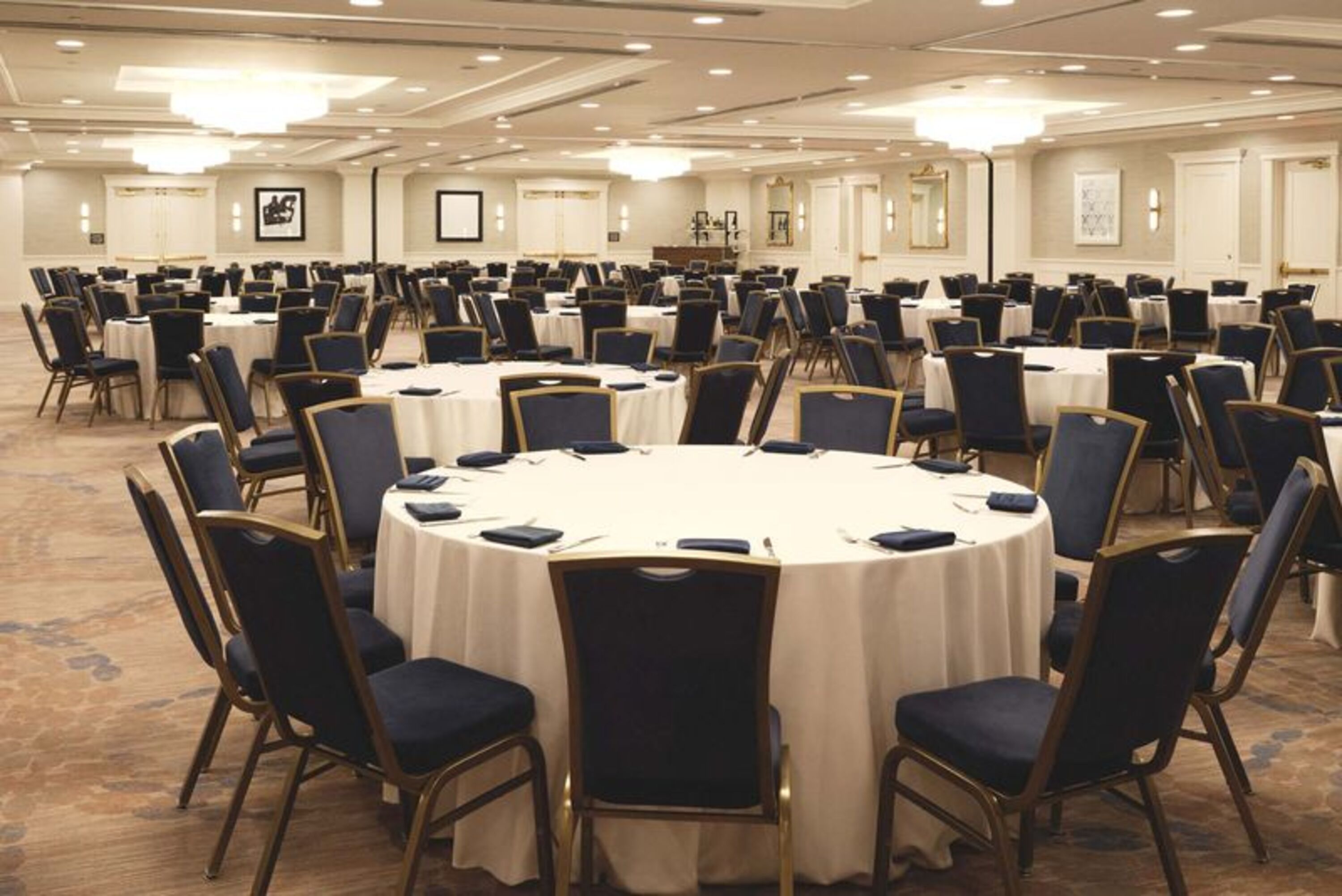 a room with tables and chairs