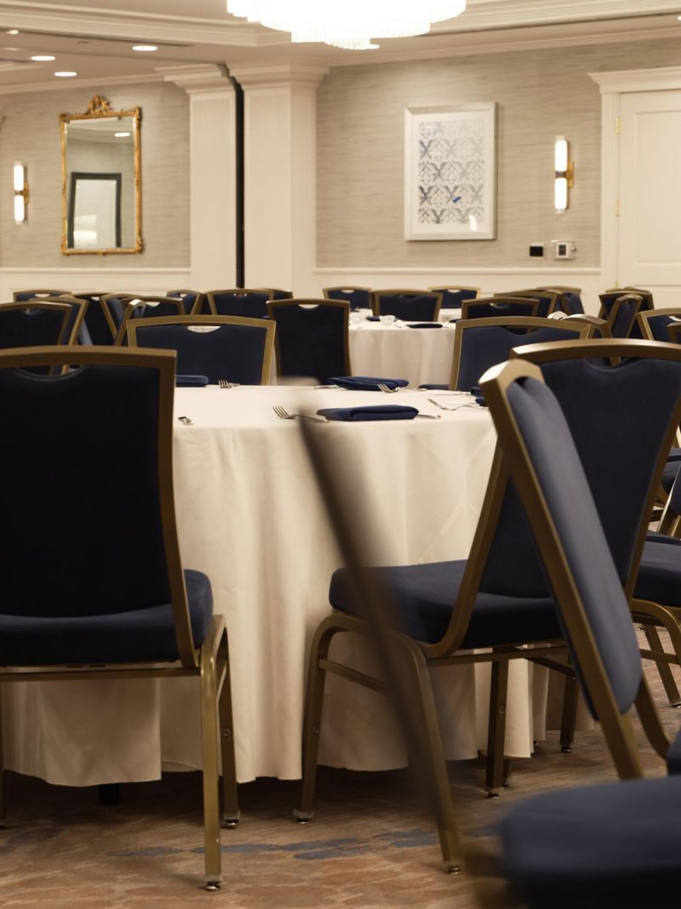 a room with tables and chairs