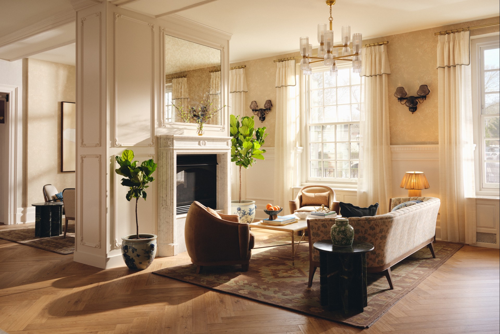 a living room with a fireplace and couches