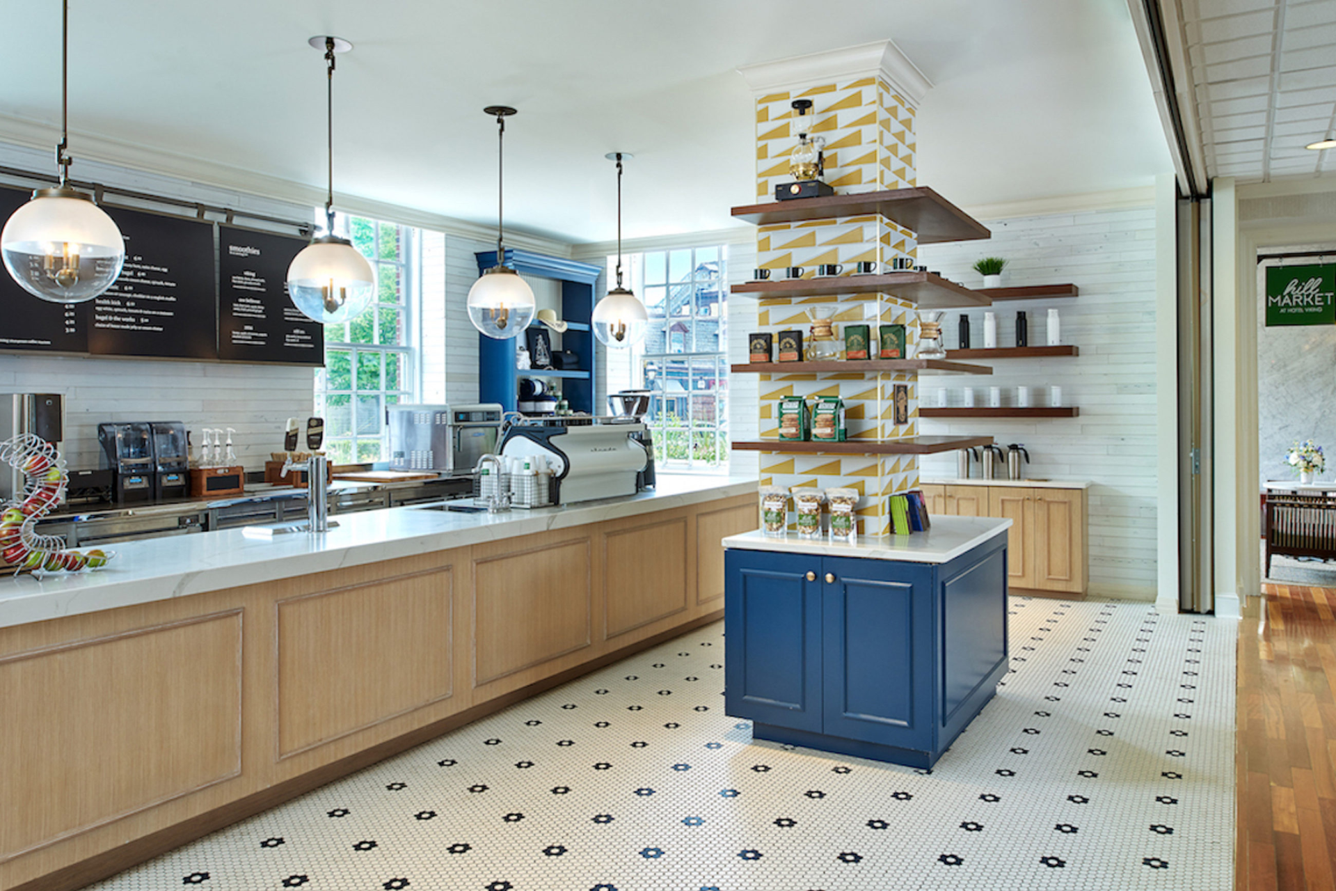 a kitchen with shelves and shelves