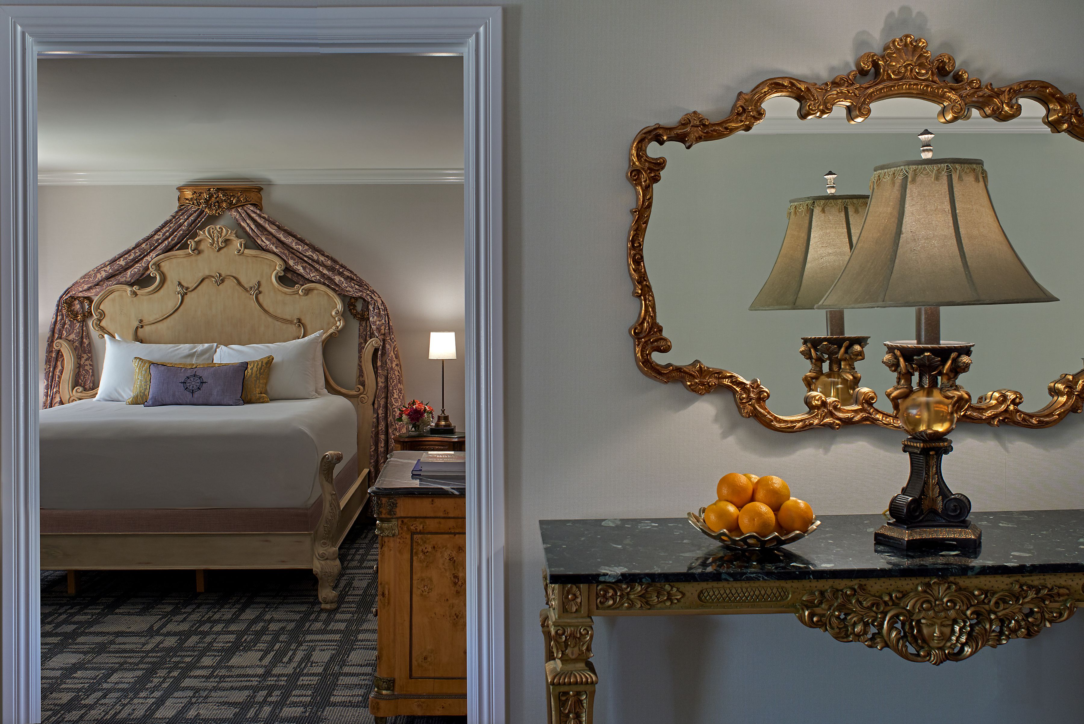 a mirror above a bed