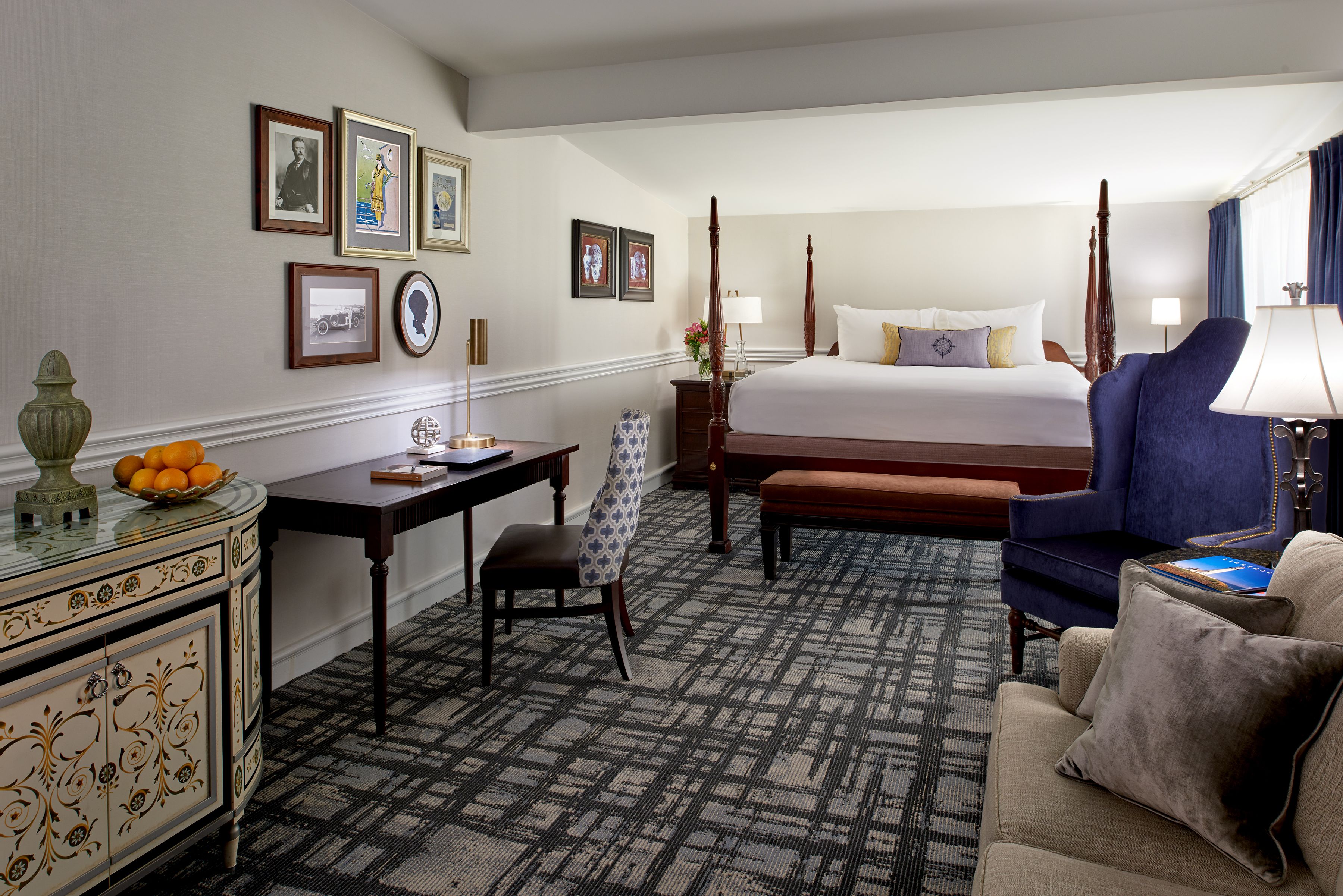 a room with a bed and a desk