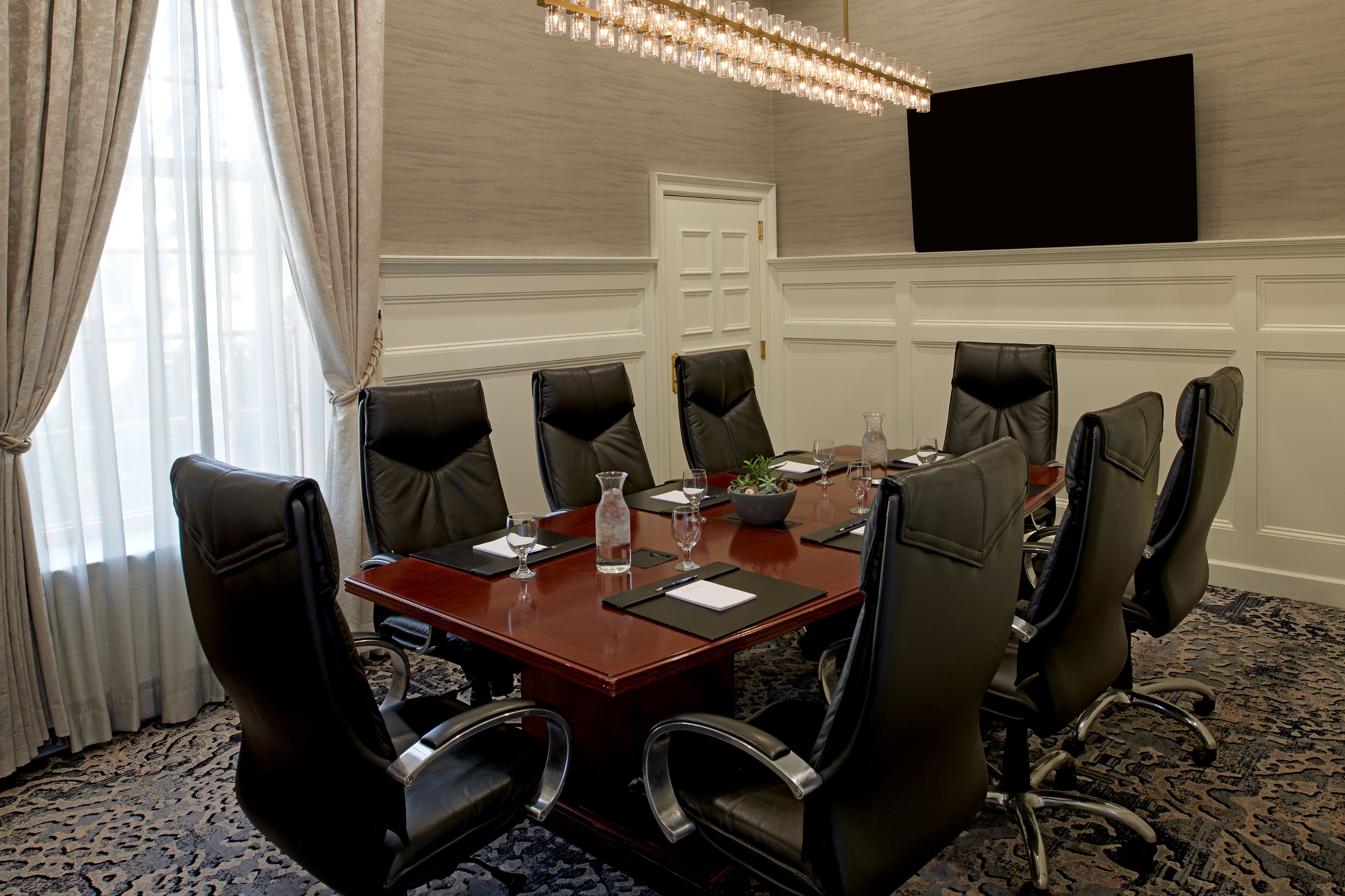 a conference room with chairs and a table