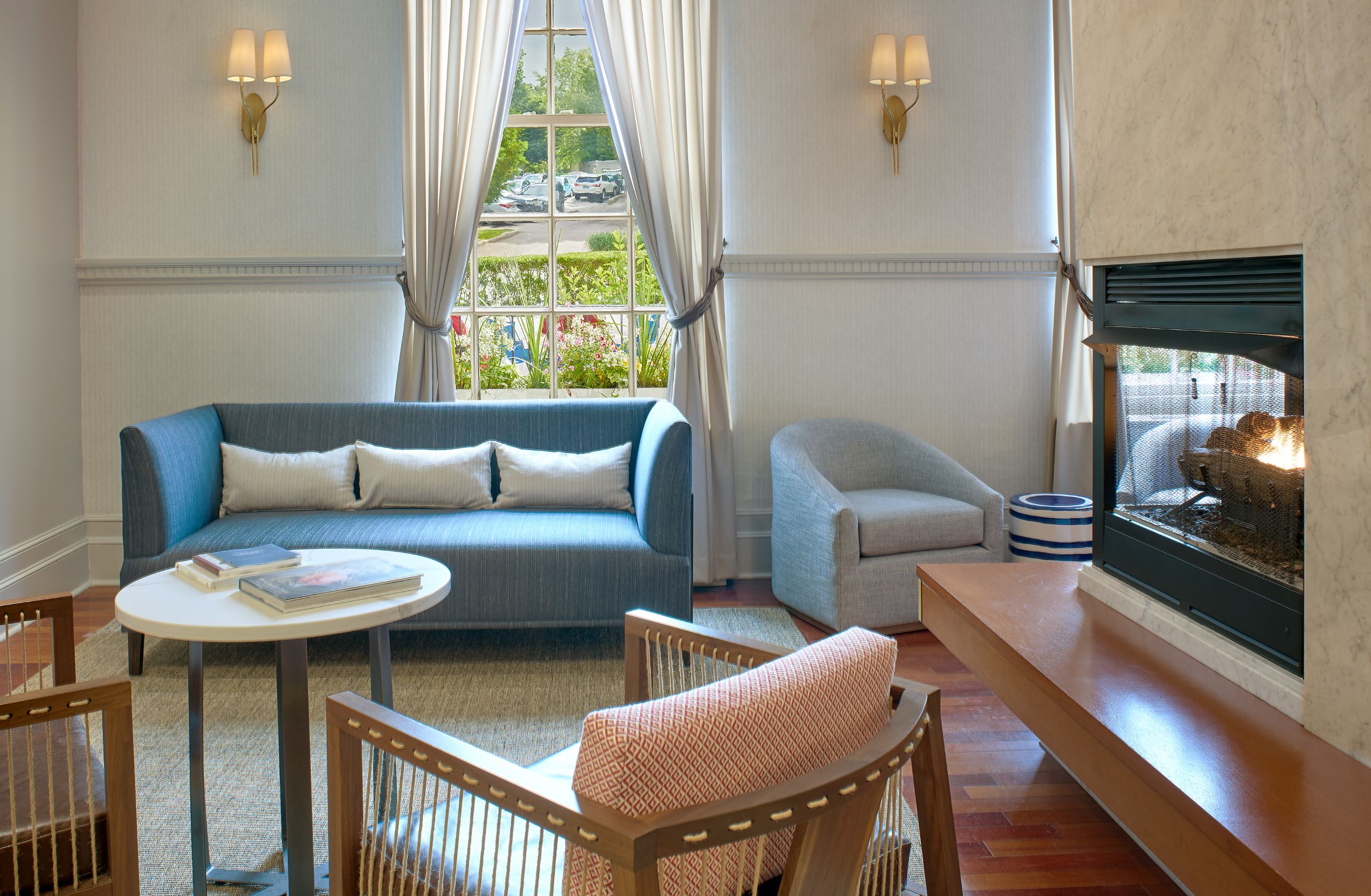 a living room with a fireplace and couches