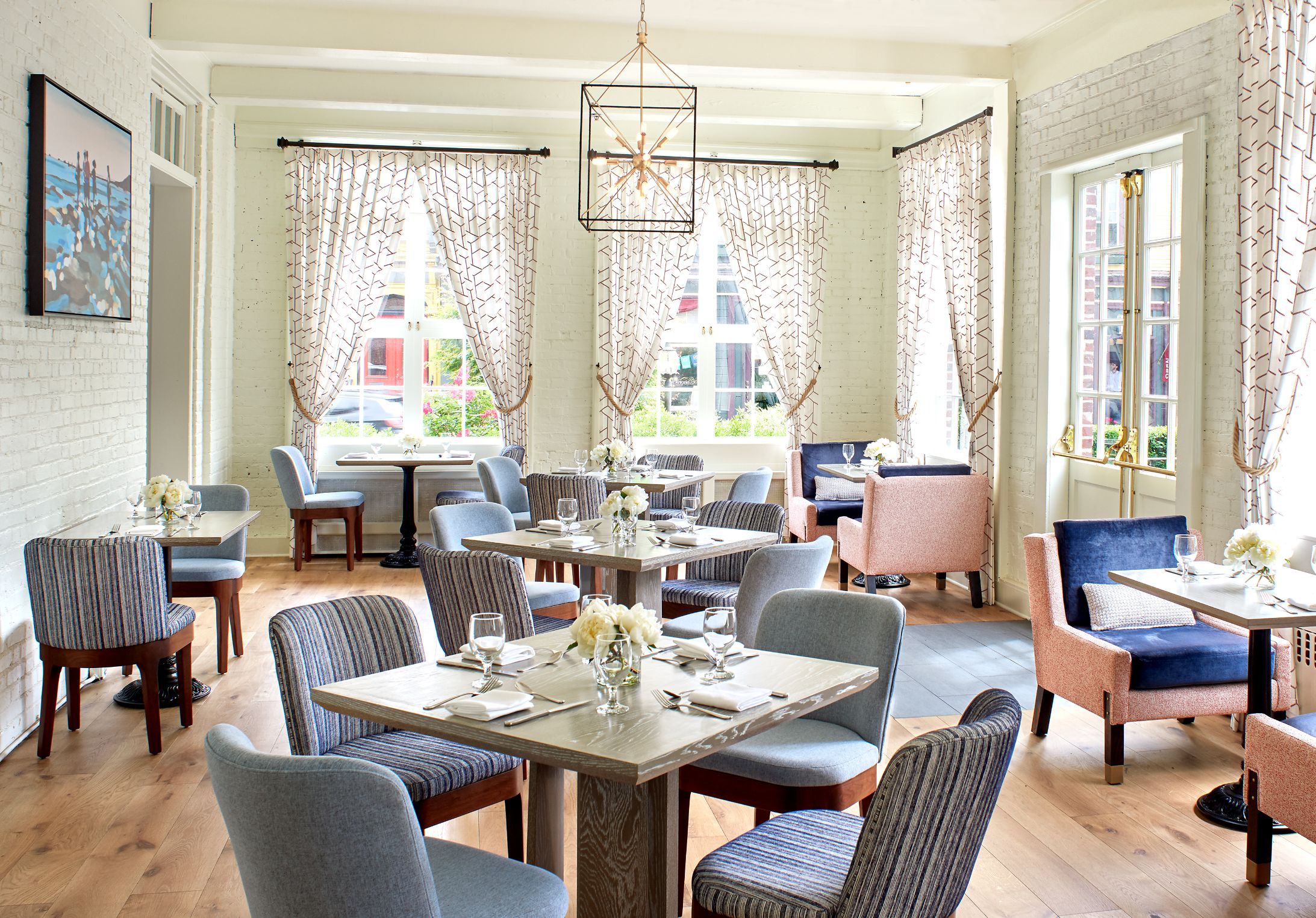 a restaurant with tables and chairs