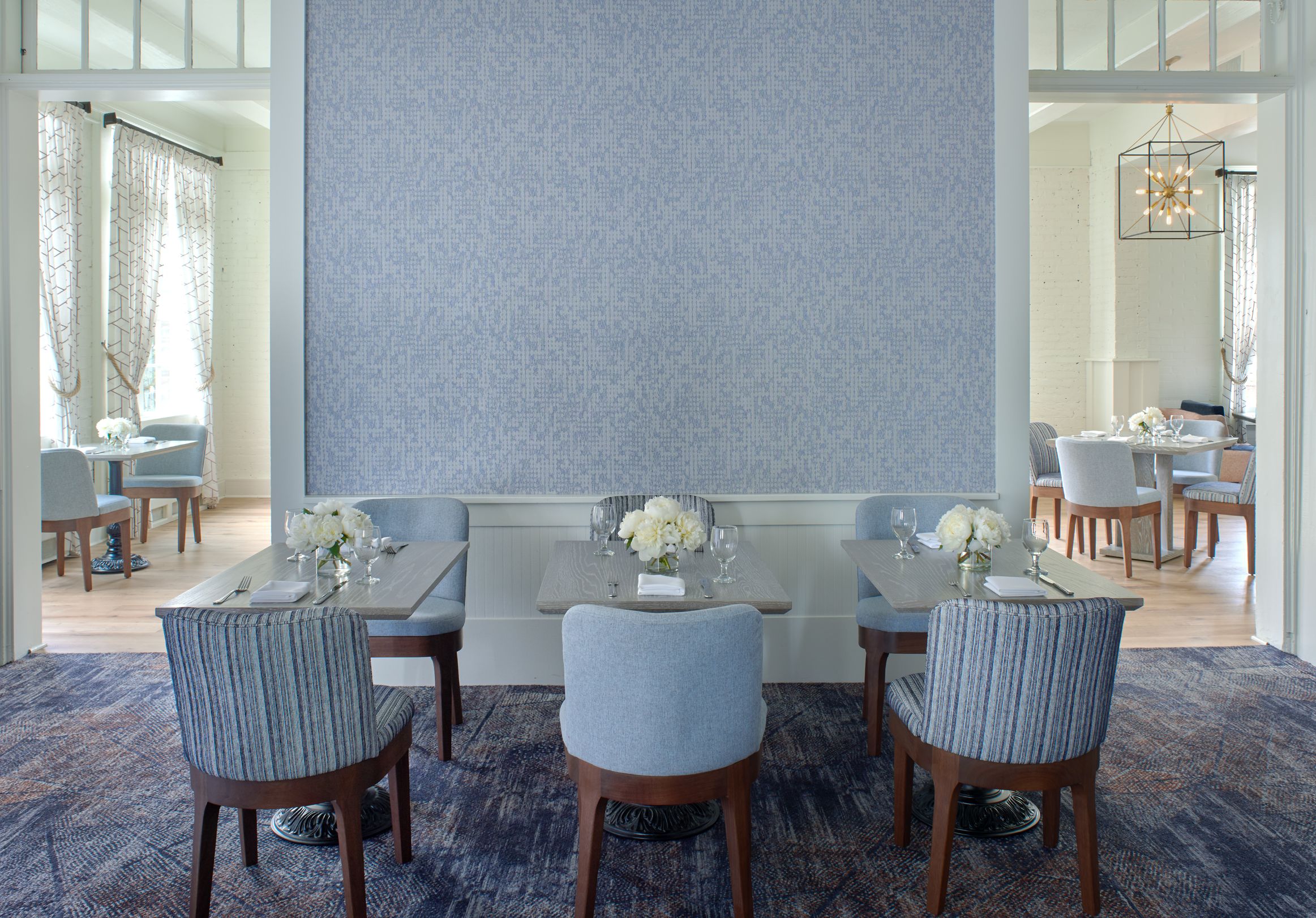 a room with tables and chairs