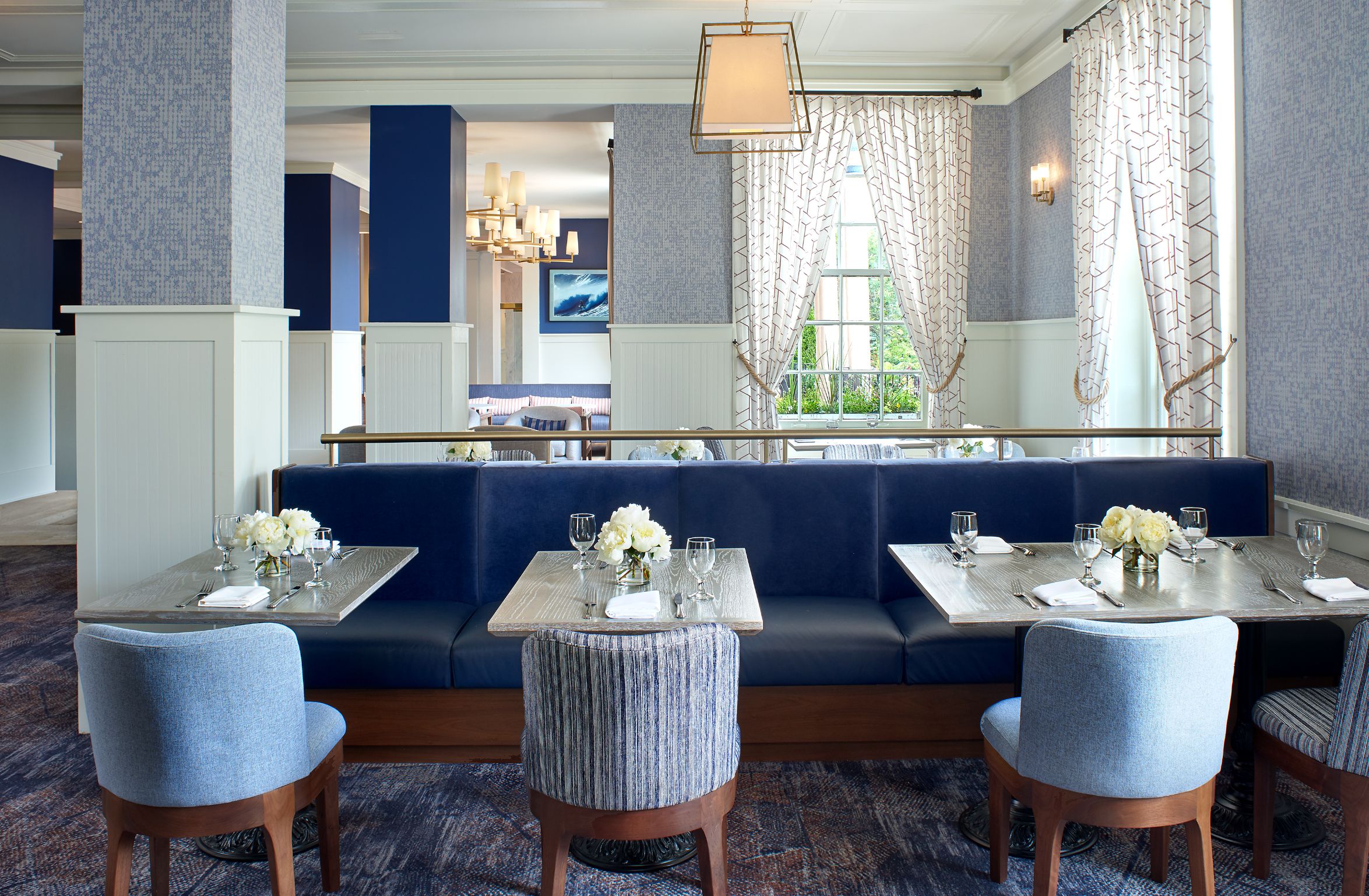 a restaurant with blue and white furniture