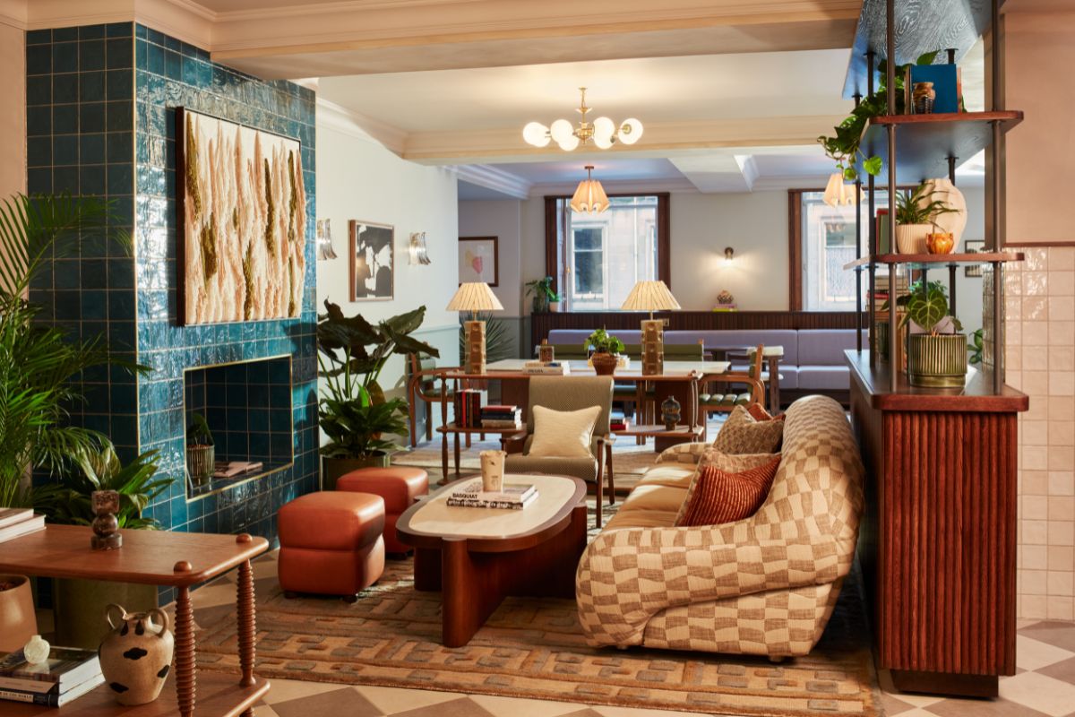 a living room with a fireplace and couches