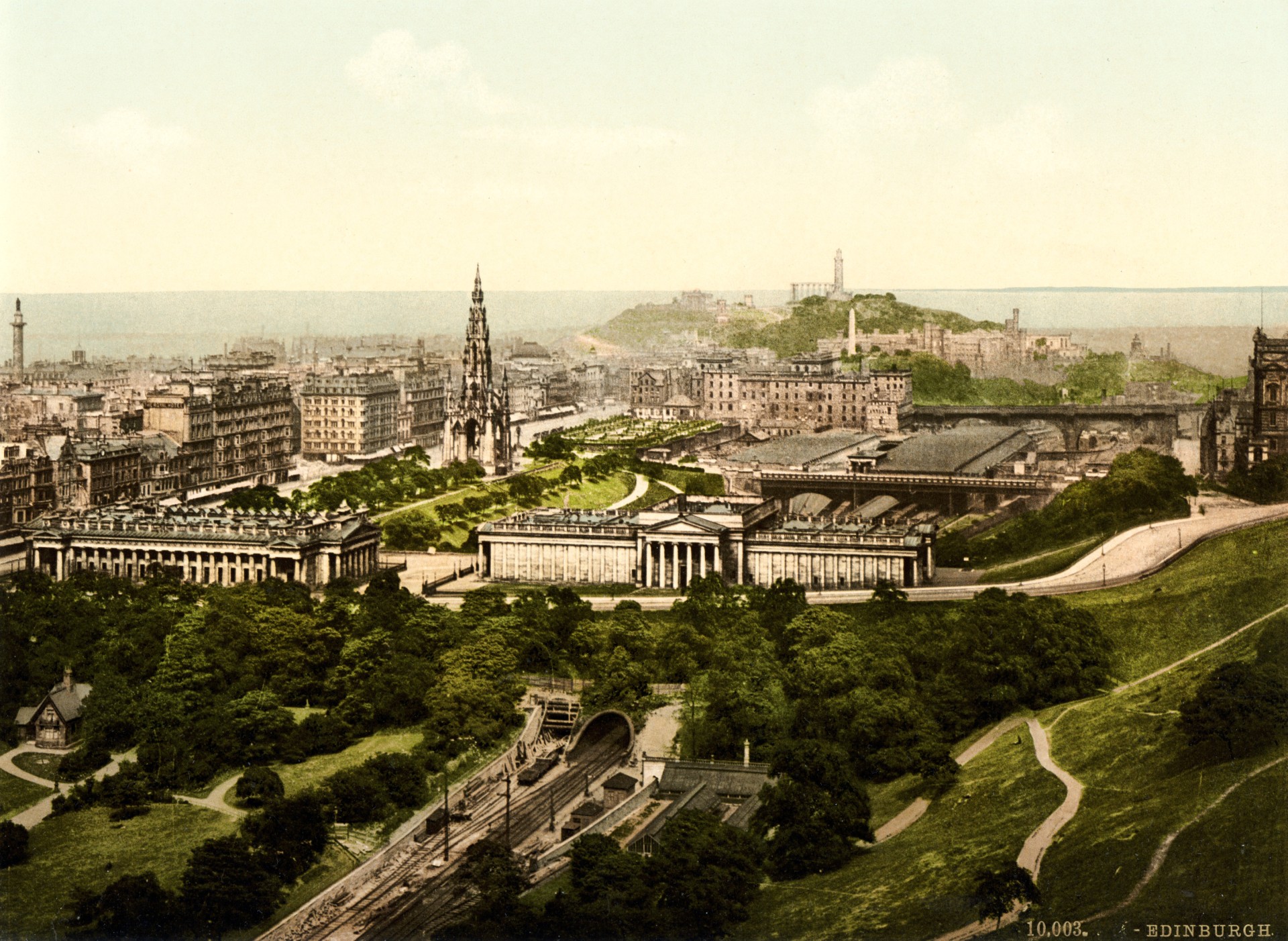 a city with a large building and a large tower