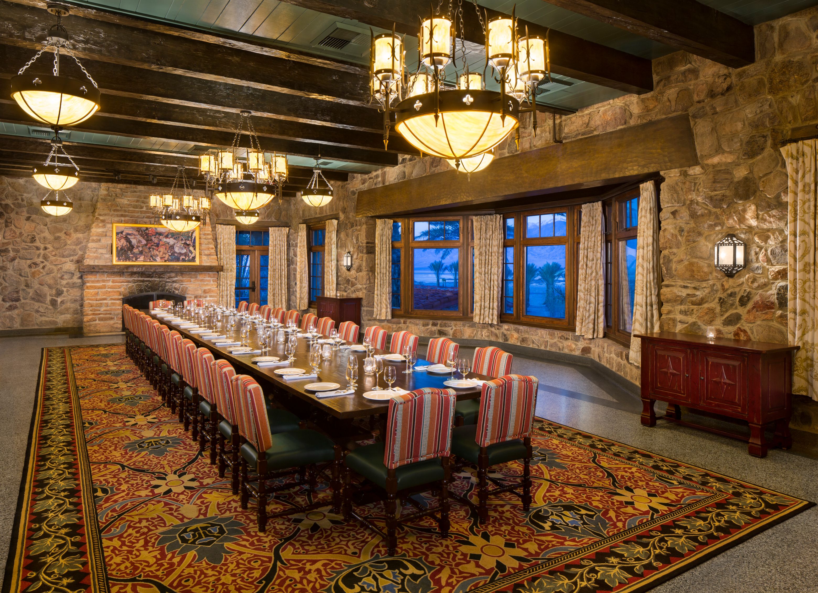 a large room with a long table and chairs