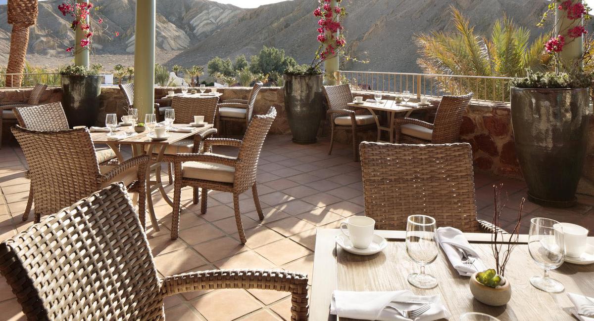 a restaurant with tables and chairs