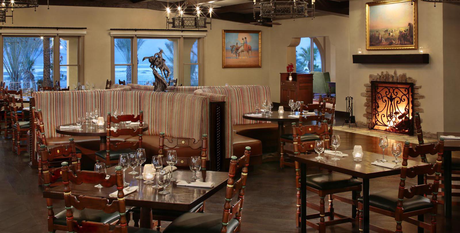 a restaurant with tables and chairs