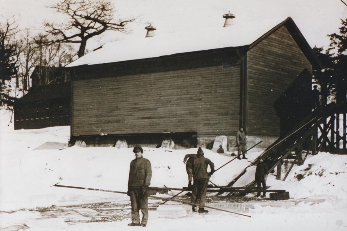 a group of men standing outside a building
