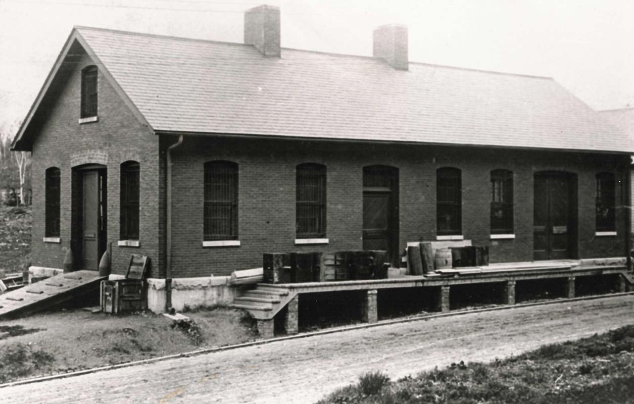 a brick building with a few windows