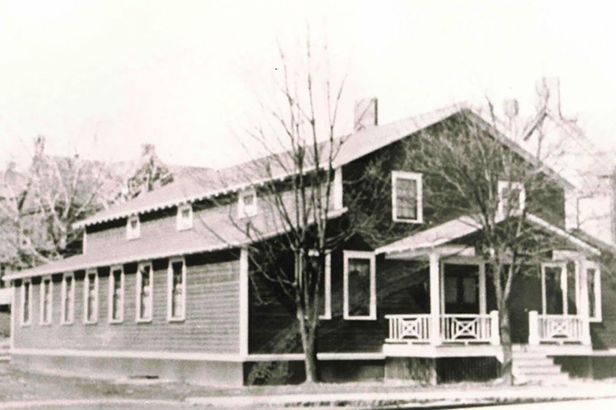 a black and white photo of a house