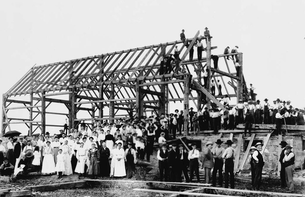 historical_image_of_amish_raising_barn_the_inn_at_leola_village_est__1867_member_of_historic_hotels_of_america_in_leola_pennsylvania