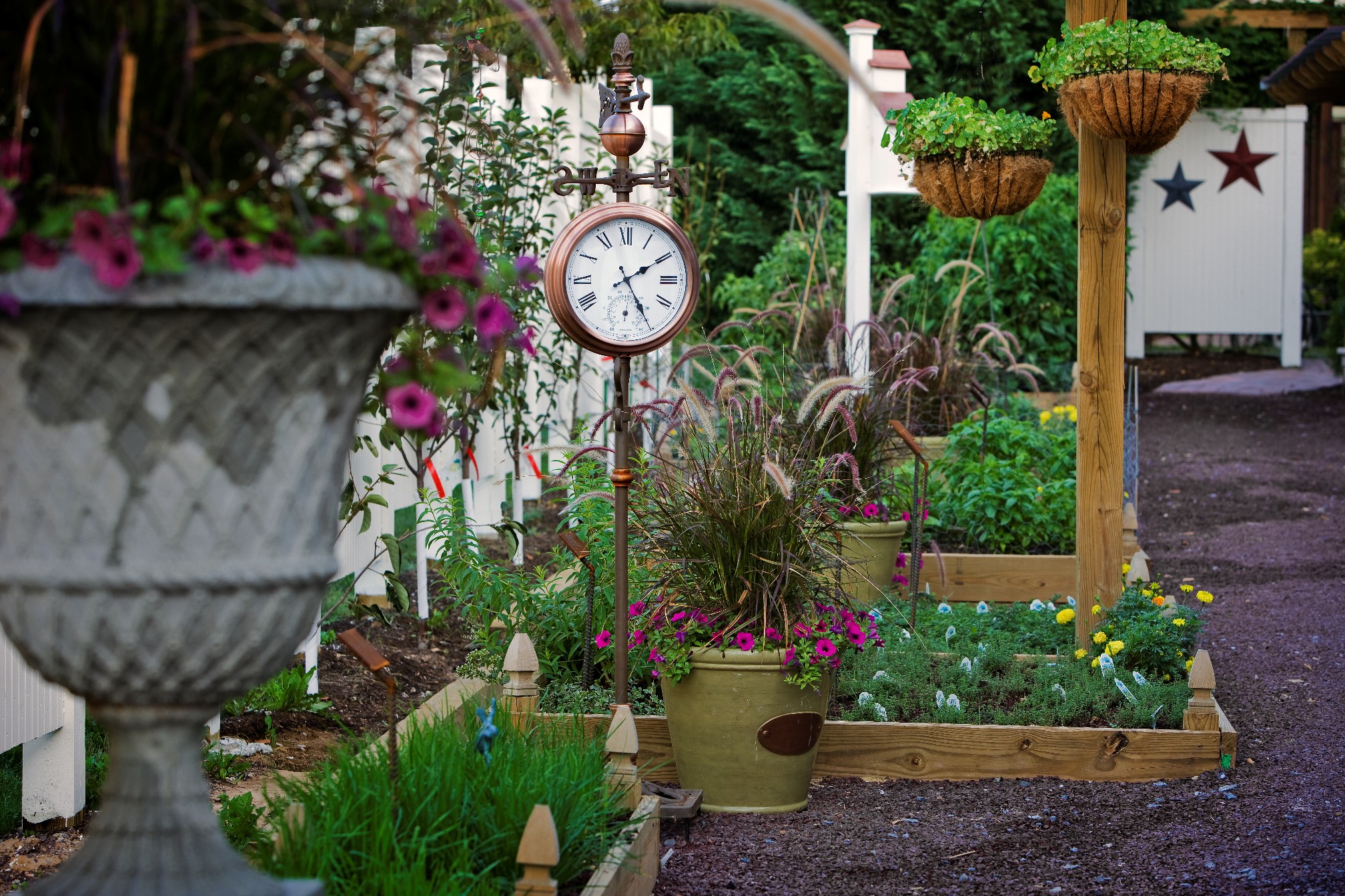 image of exterior gardens with clock inn at leola village est_ 1867 pennsylvania_high
