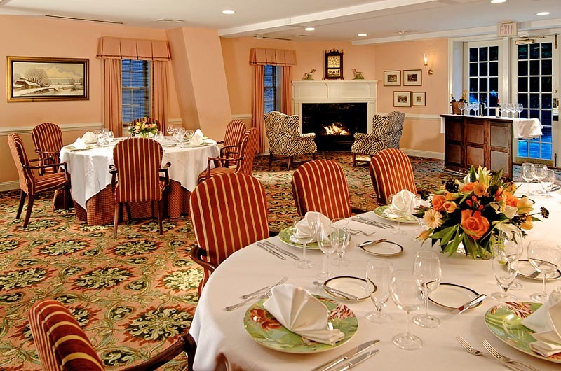 a room with tables and chairs