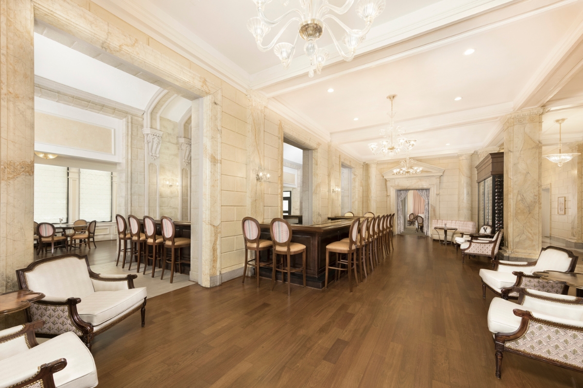 a room with a table and chairs