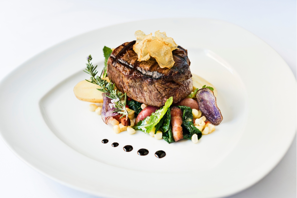 a plate of food on a white surface