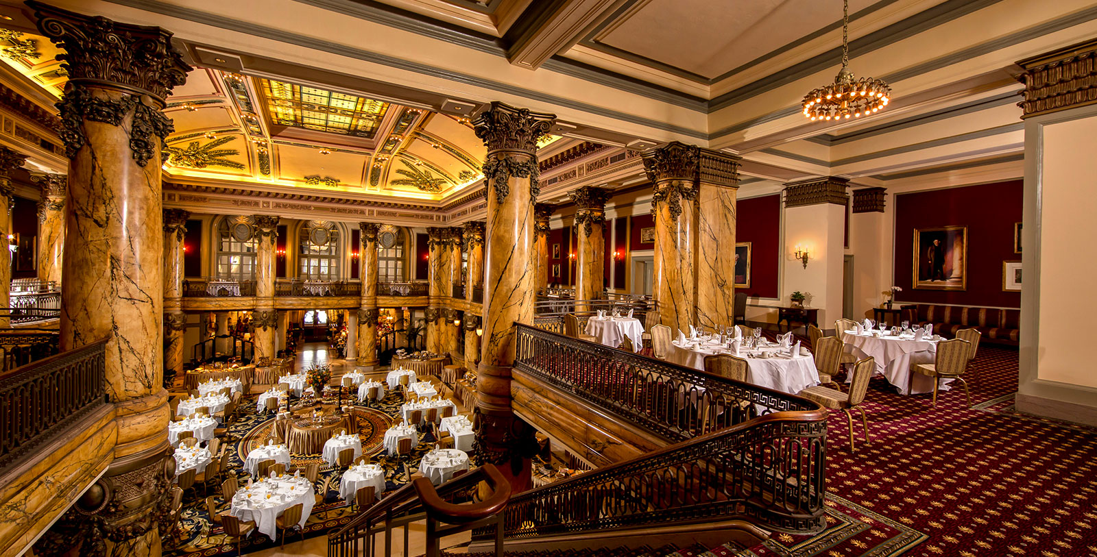 a large room with tables and chairs