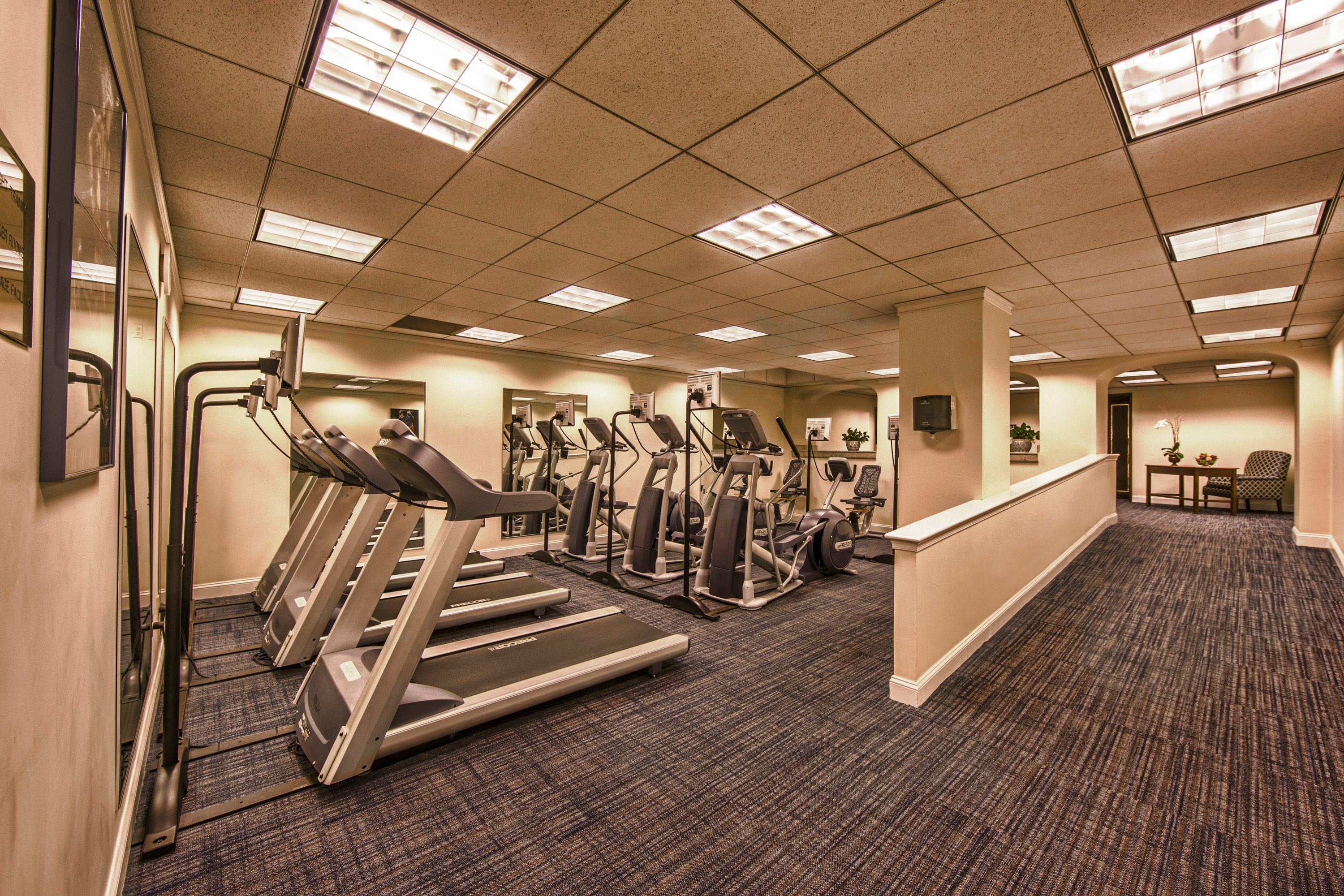 a room with treadmills and treadmills