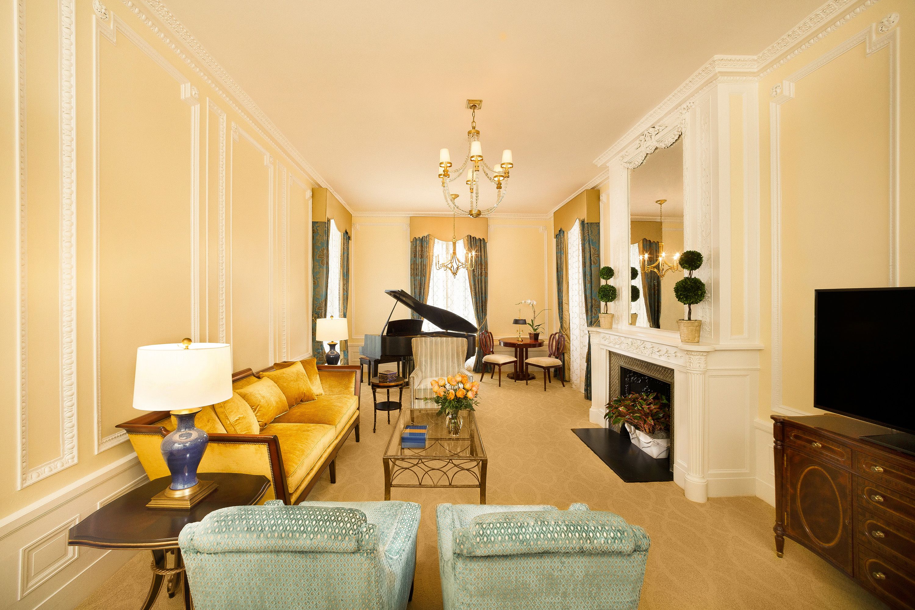 a room with a piano and a couch