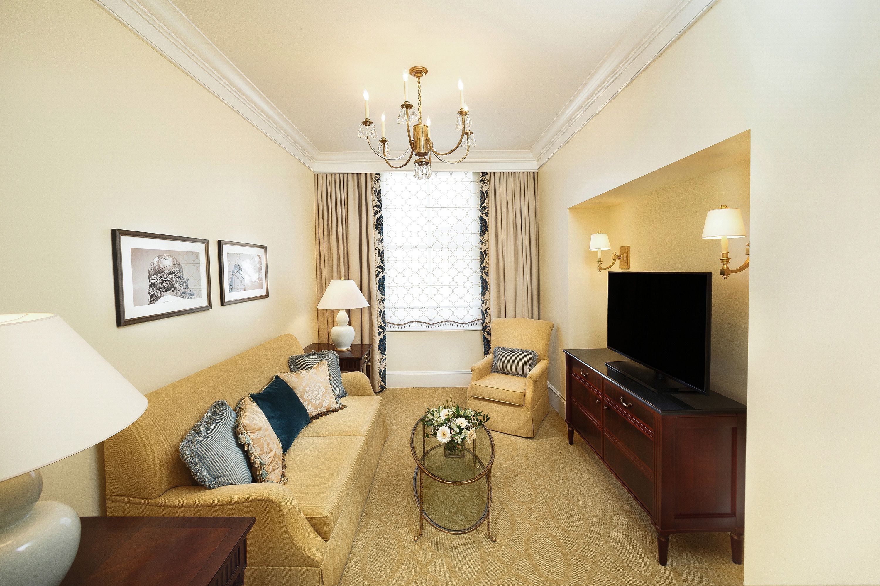 a living room with a television and couch