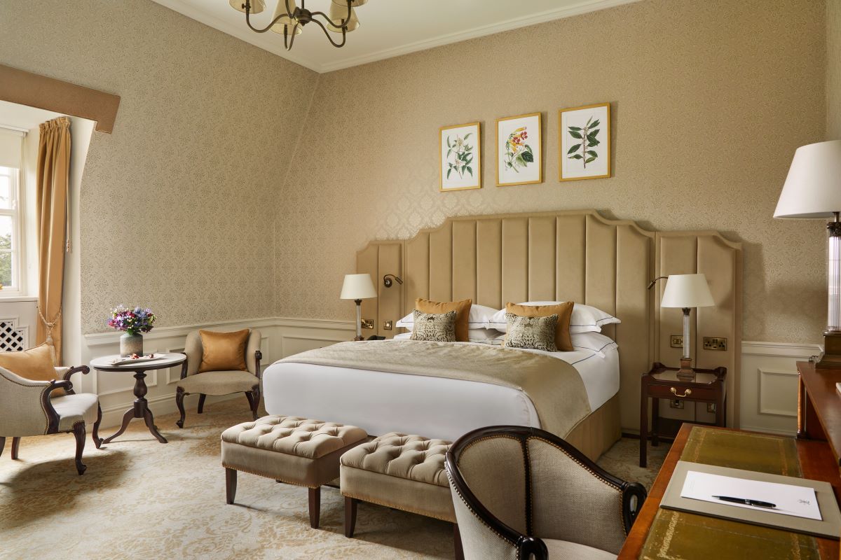 a bedroom with a bed and a table